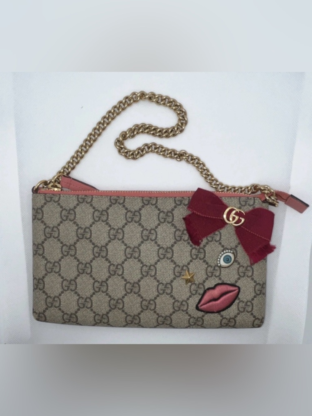 Gucci Beige GG Supreme Chain Pochette with Pink Trim and Red Bow Accent
